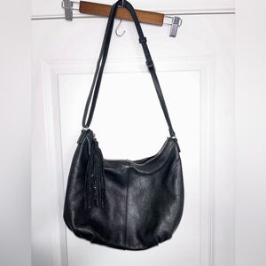 Margot New York Black Pebbled
Leather Hobo Bag with Tassel Accent